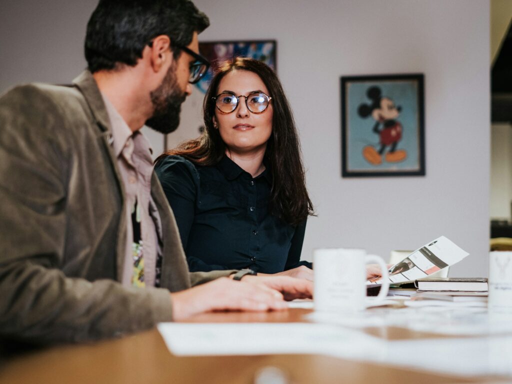 Couple reading retirement planning checklist