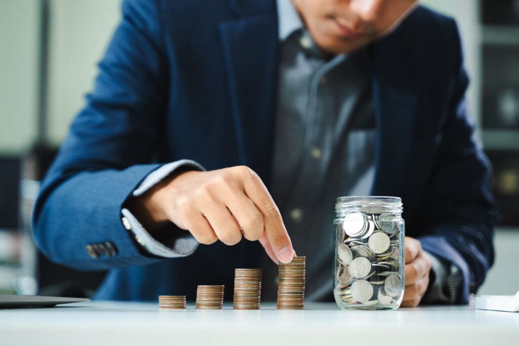 Retirement planning coin savings in jar